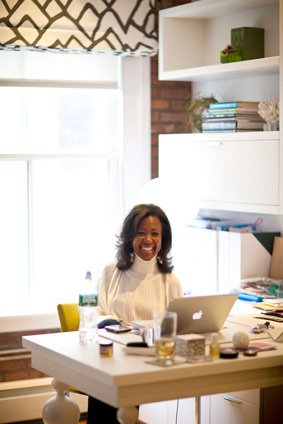 Photo by Mel Barlow of Kalyn Johnson in home office designed by Ghislaine Vinas
